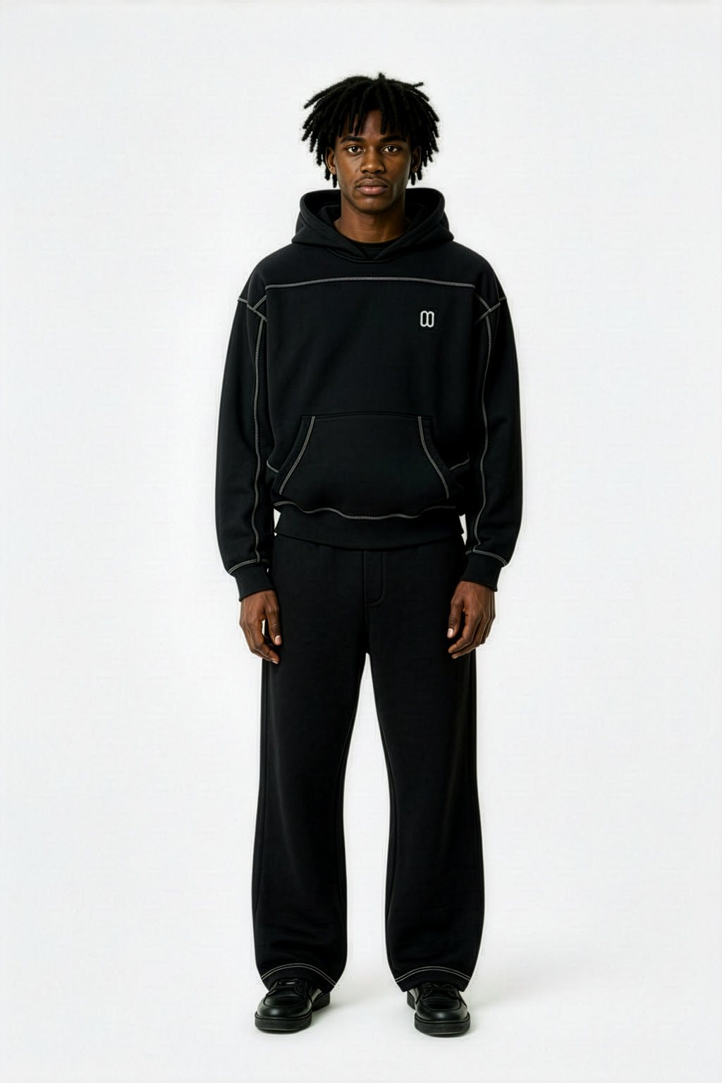 Black Contrast-Stitched Boxy Fleece Hoodie – Front on Model | TheTwoZero