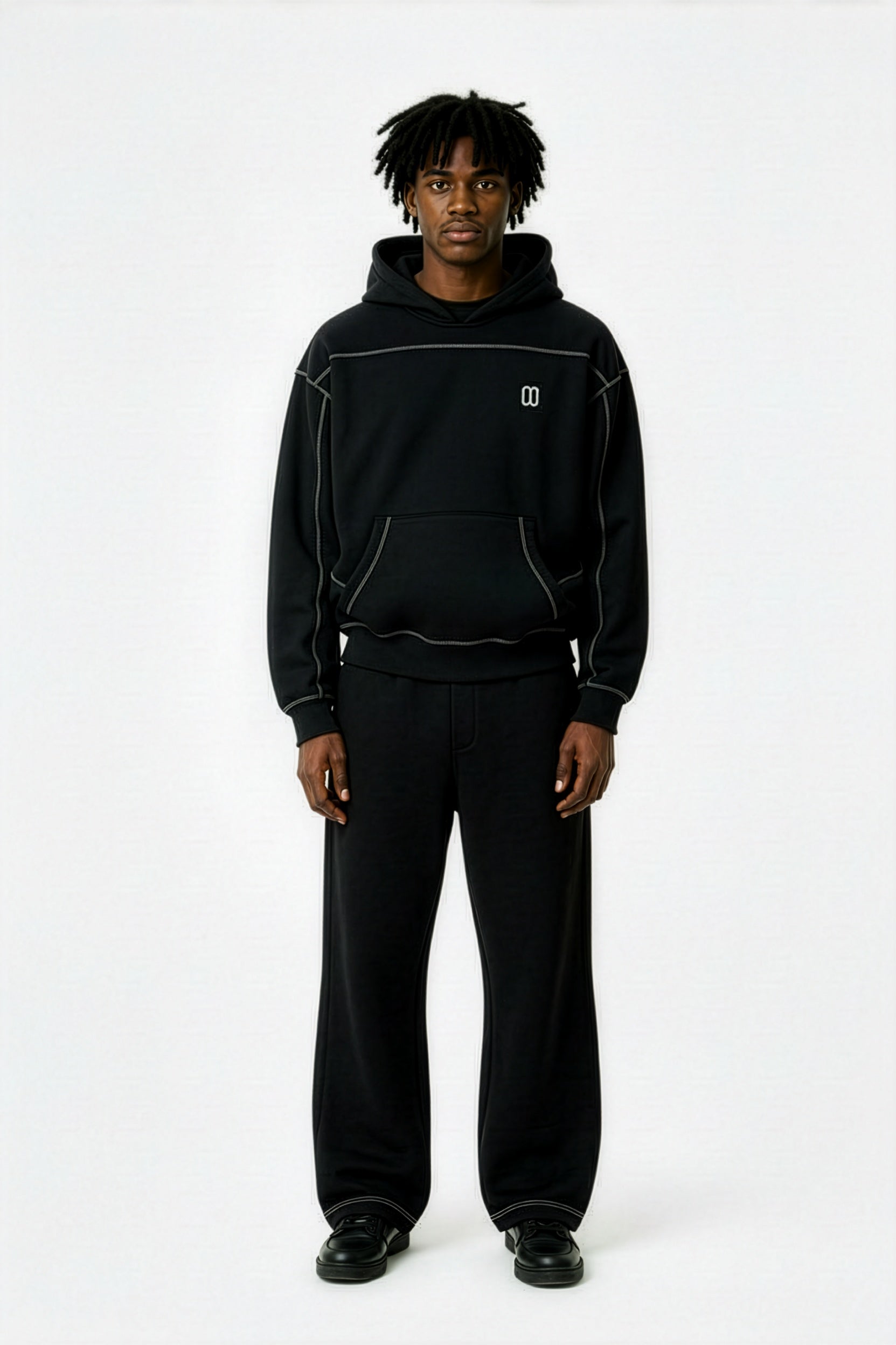 Black Contrast-Stitched Boxy Fleece Hoodie – Front on Model | TheTwoZero