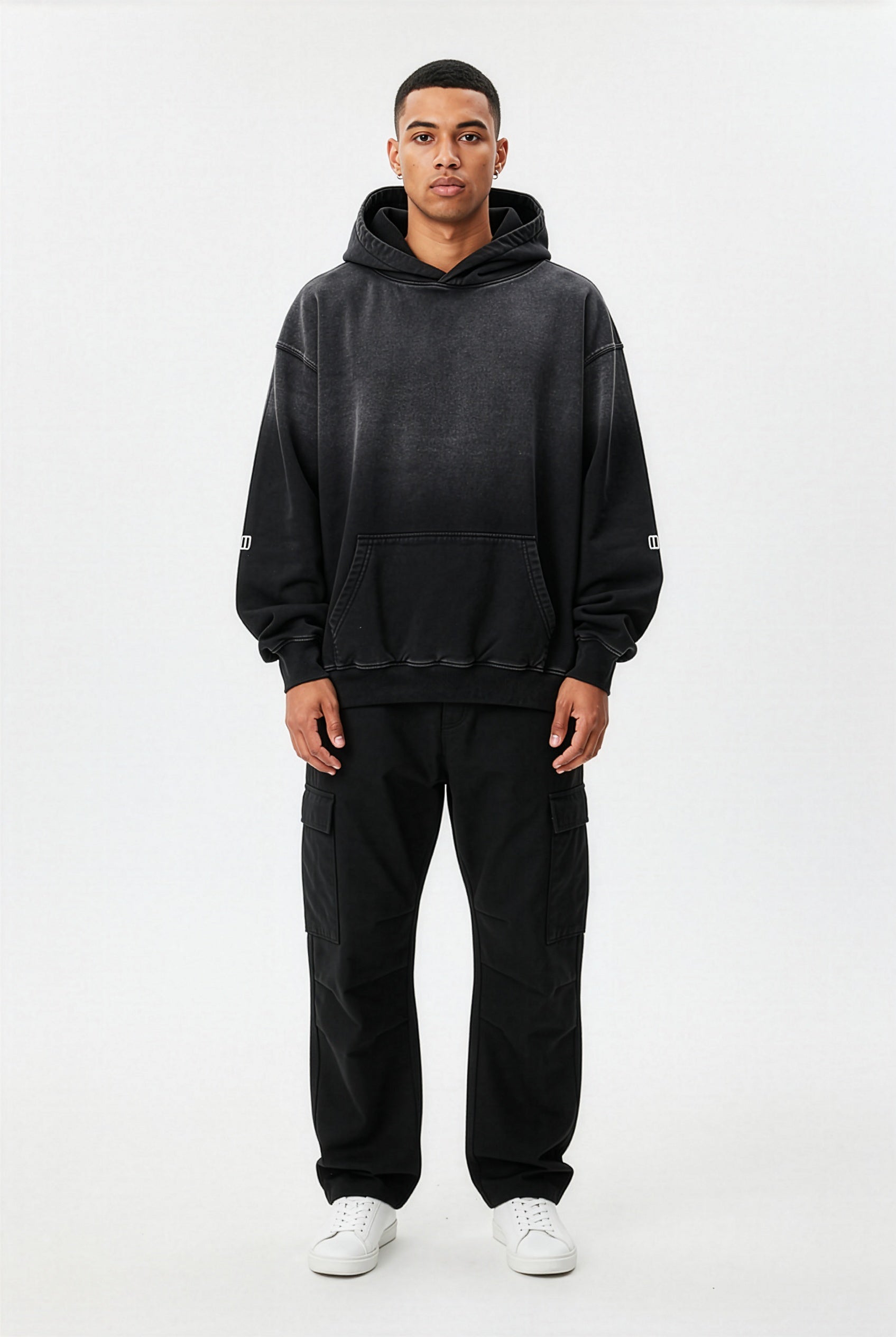 Black Heavyweight Sunfade Oversized Hoodie – Front on Model | TheTwoZero