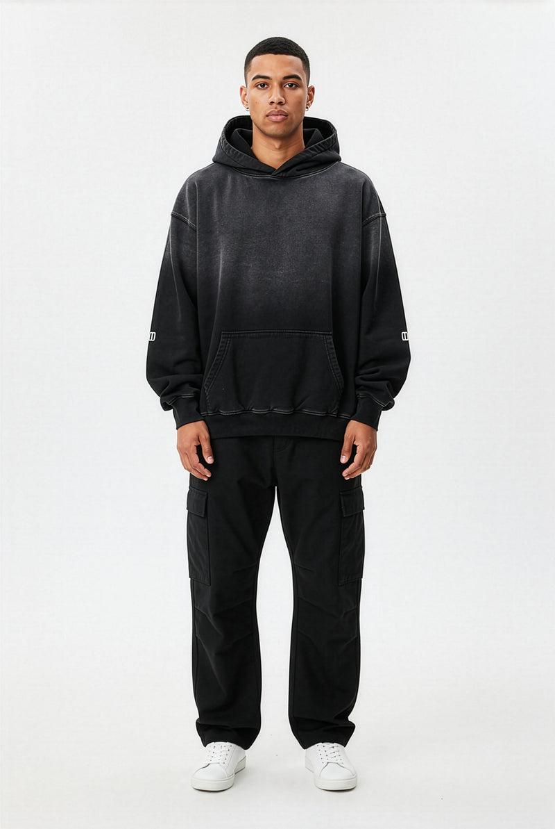 Black Heavyweight Sunfade Oversized Hoodie – Front on Model | TheTwoZero